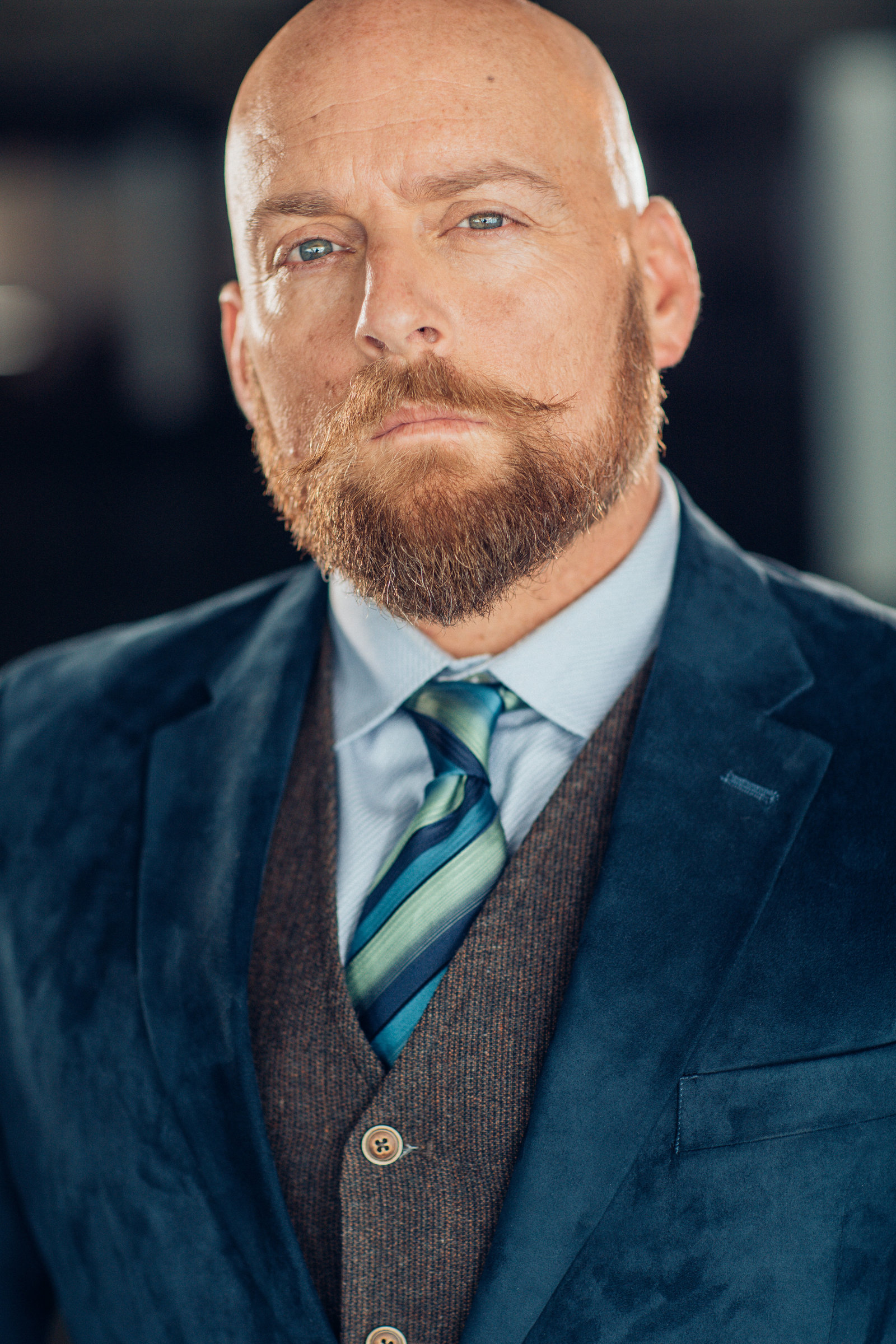 Headshot Photo Of Man In Blue Suit