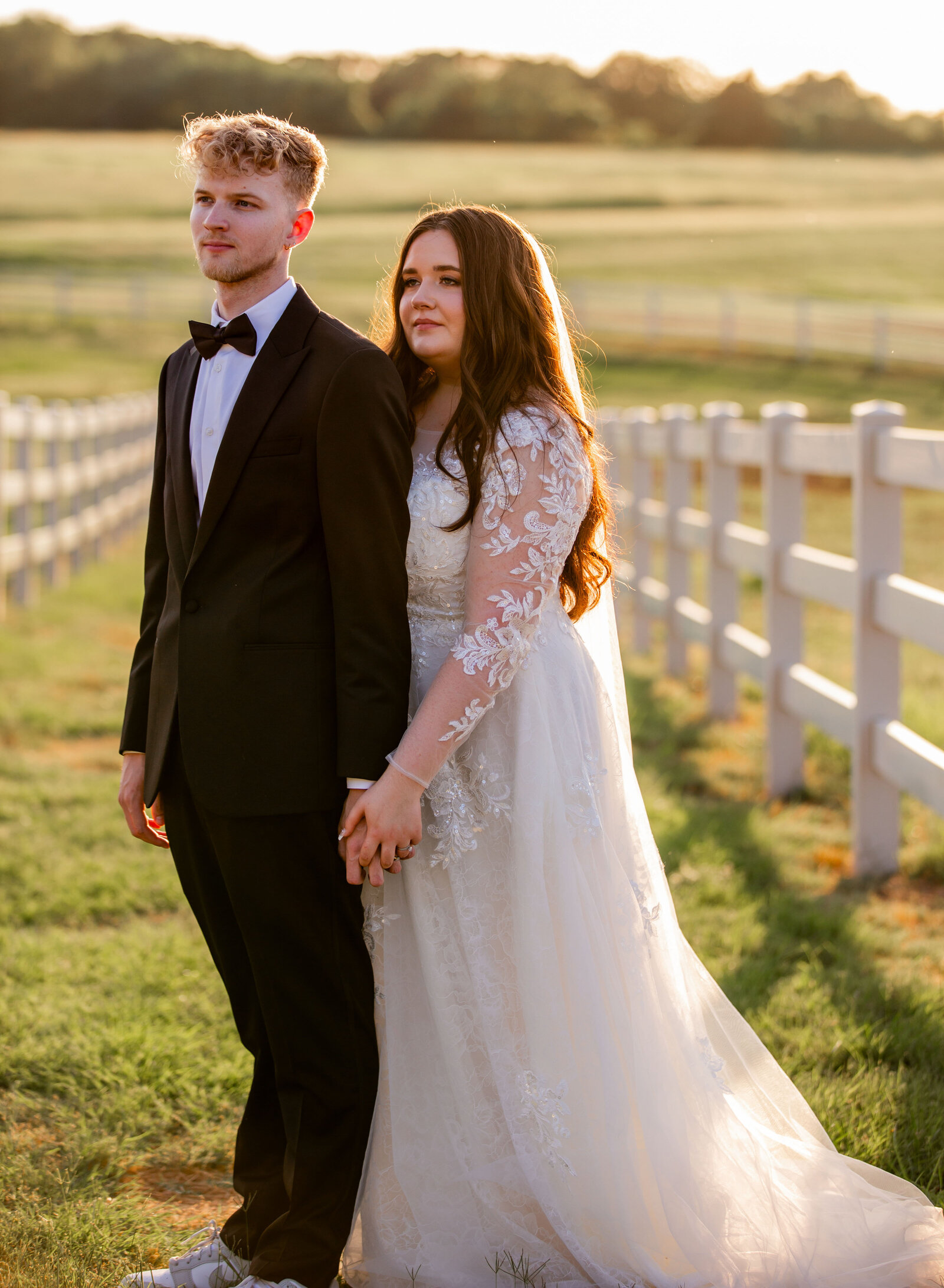 bride and groom holding hands