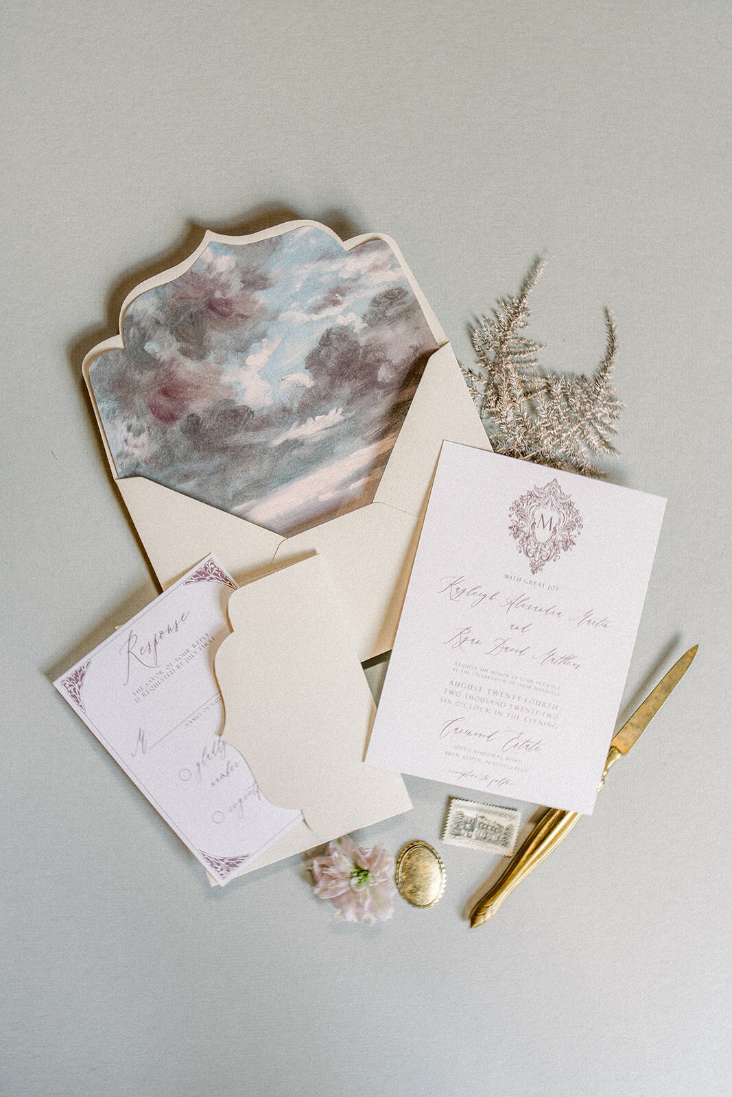 A beautifully crafted wedding invitation suite, reflecting the elegance of a wedding at the Filoli estate in Woodside, California.