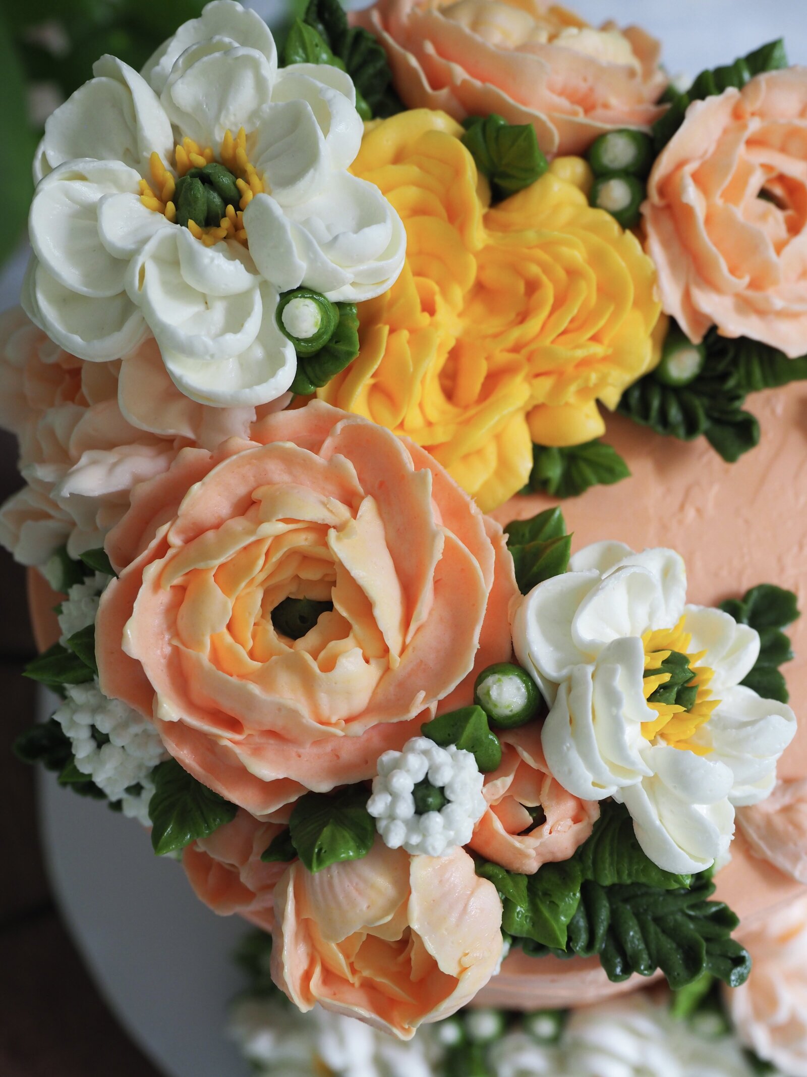 Close up of floral buttercream flower cake