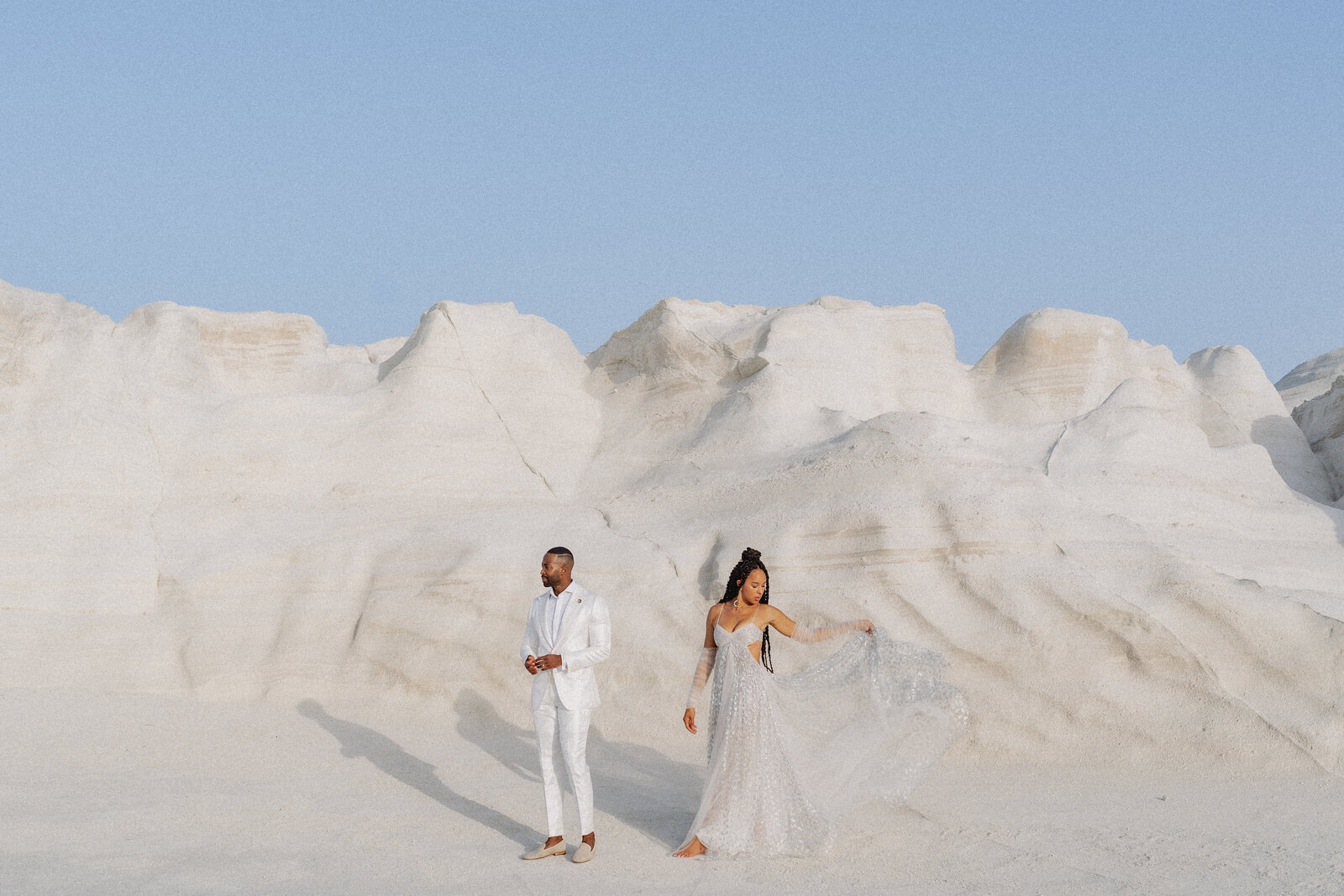 creative travel wedding photo of bride and groom in  Greece