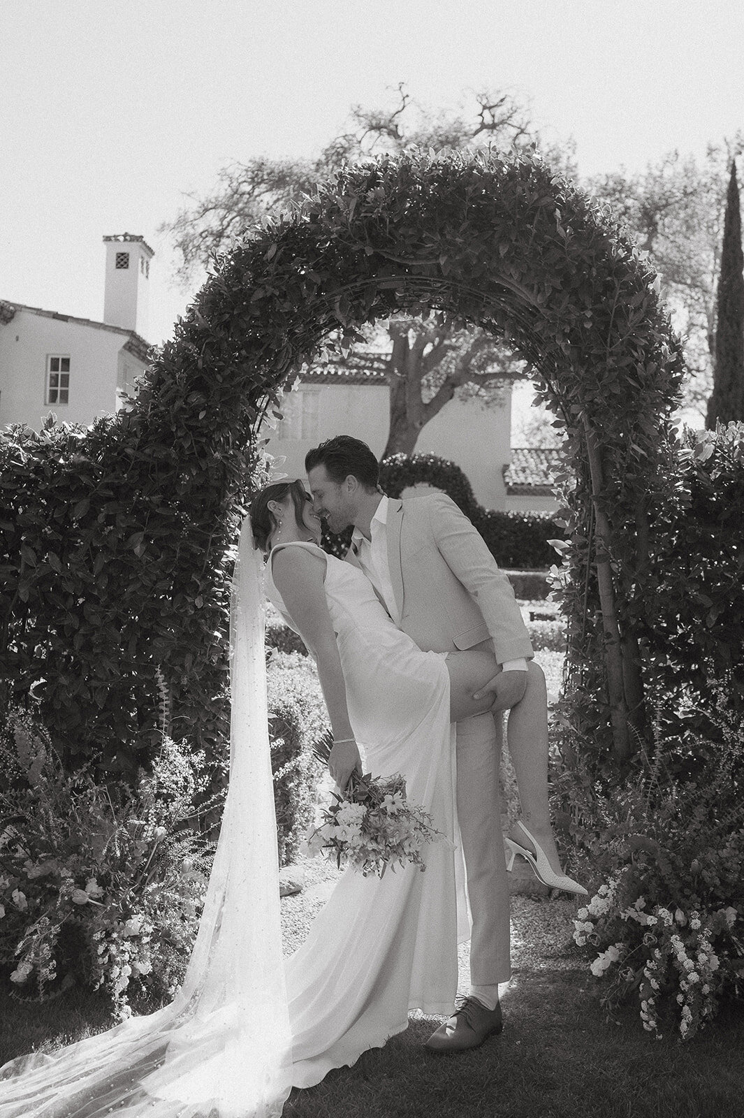 groom dipping bride during elopement