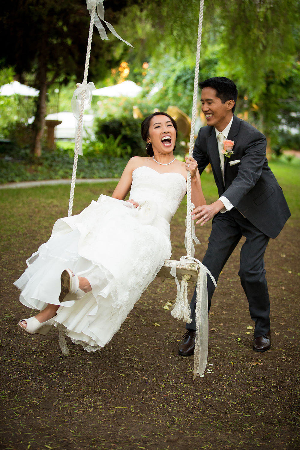 Natural portrait of the bride swinging at Green Gables