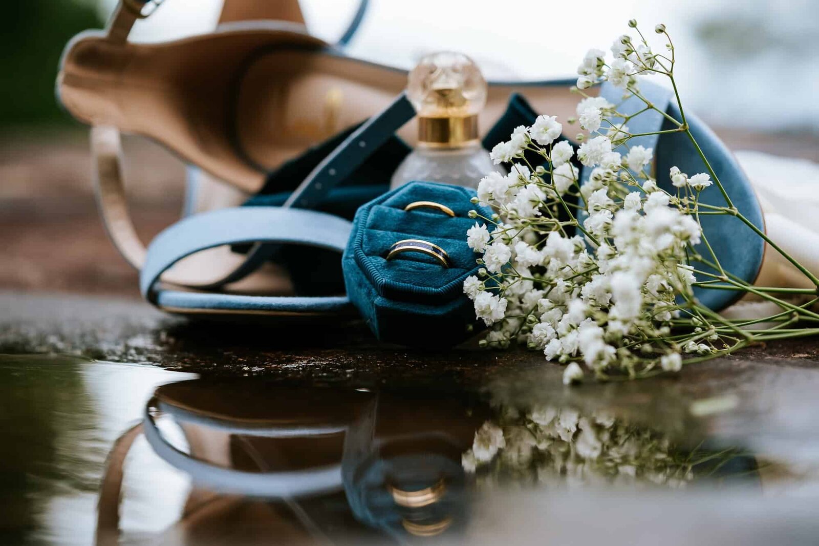 wedding detail shot of rings and shoes at terra incognita vineyard wedding venue