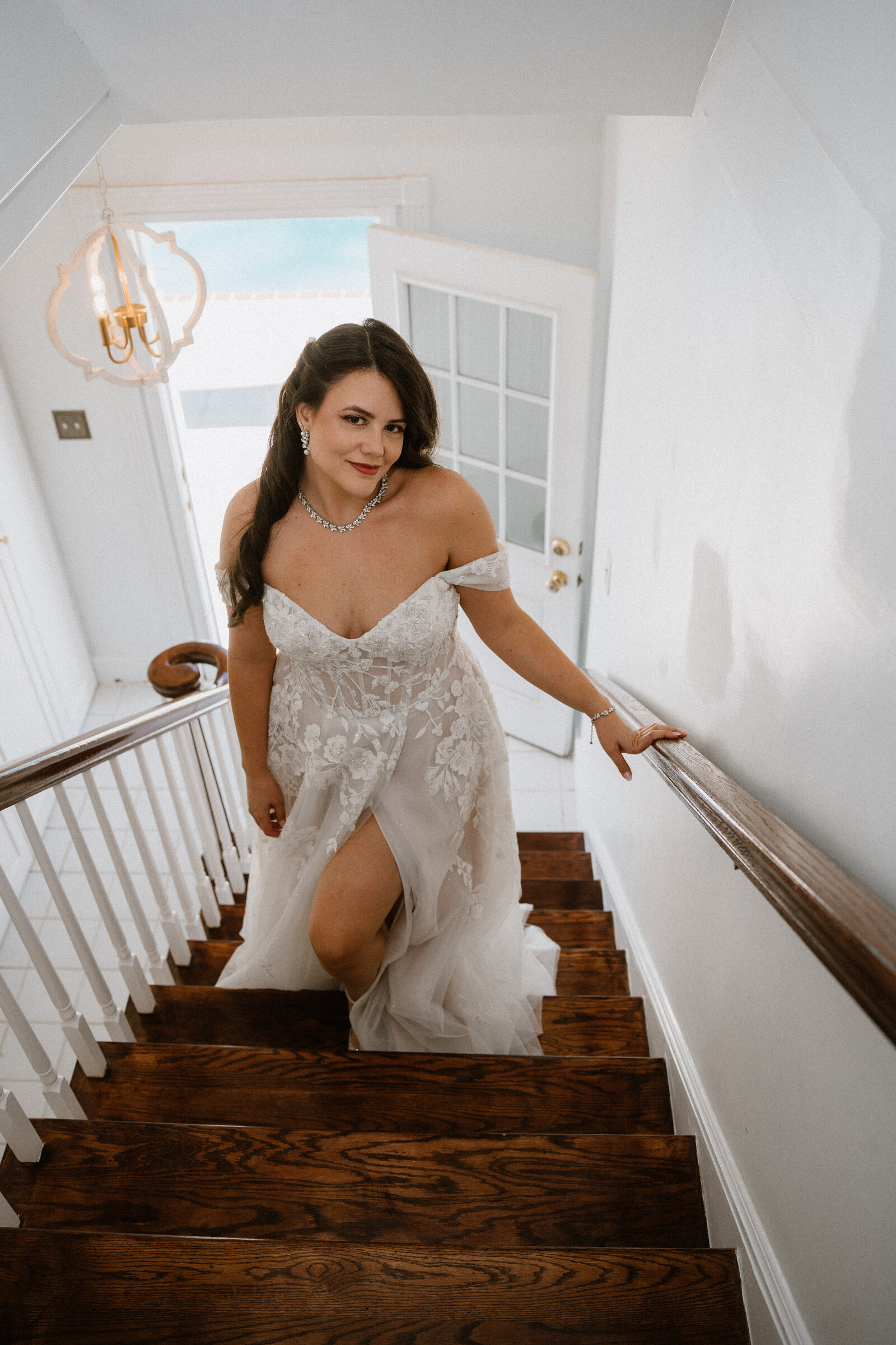 bride walking up the stairs