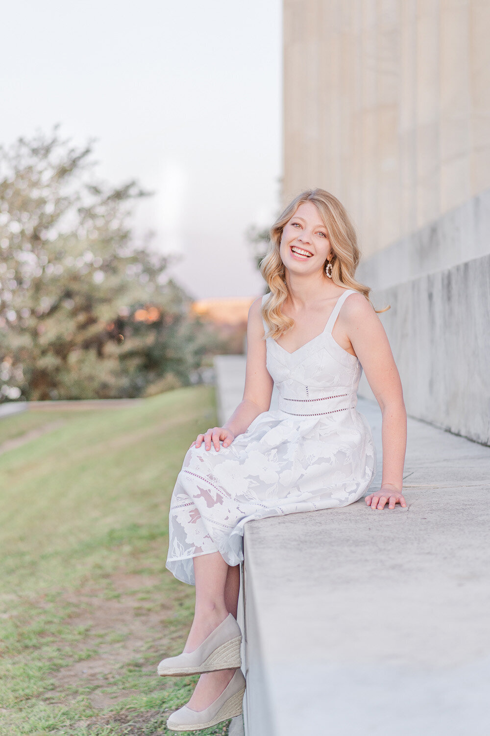 girl at the steps of Lincoln Memorial during senior photos