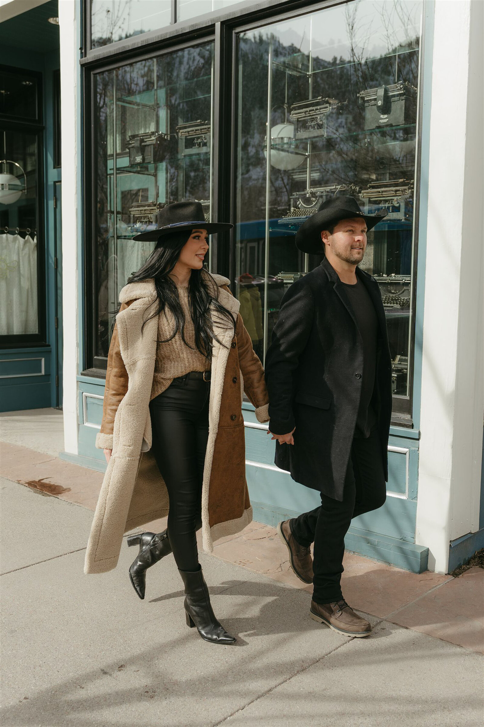 Fashion-forward winter engagement outfits in Aspen, Colorado