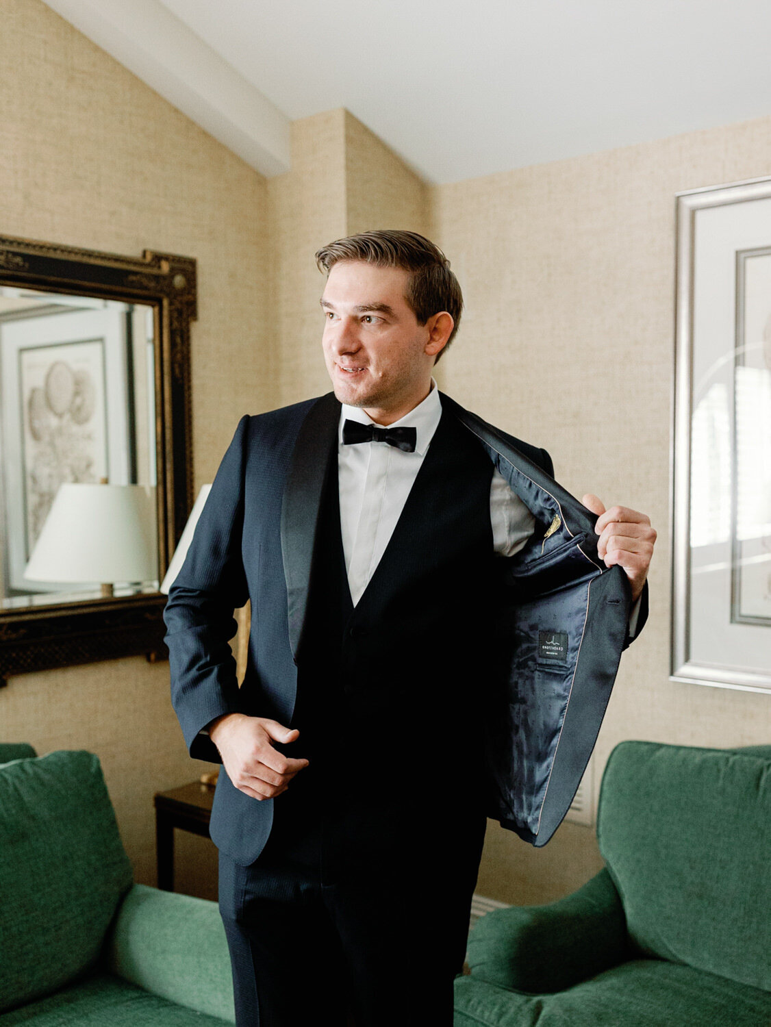Groom showing off his custom tux.