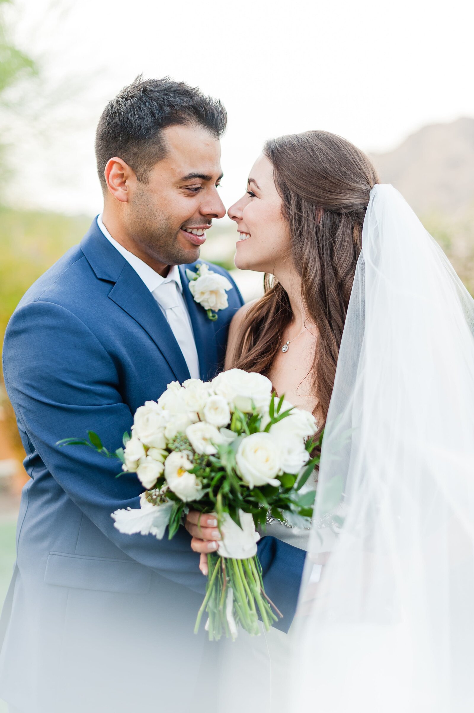 Bride and Groom portrait with veil at the Sanctuary on Camelback Mountain