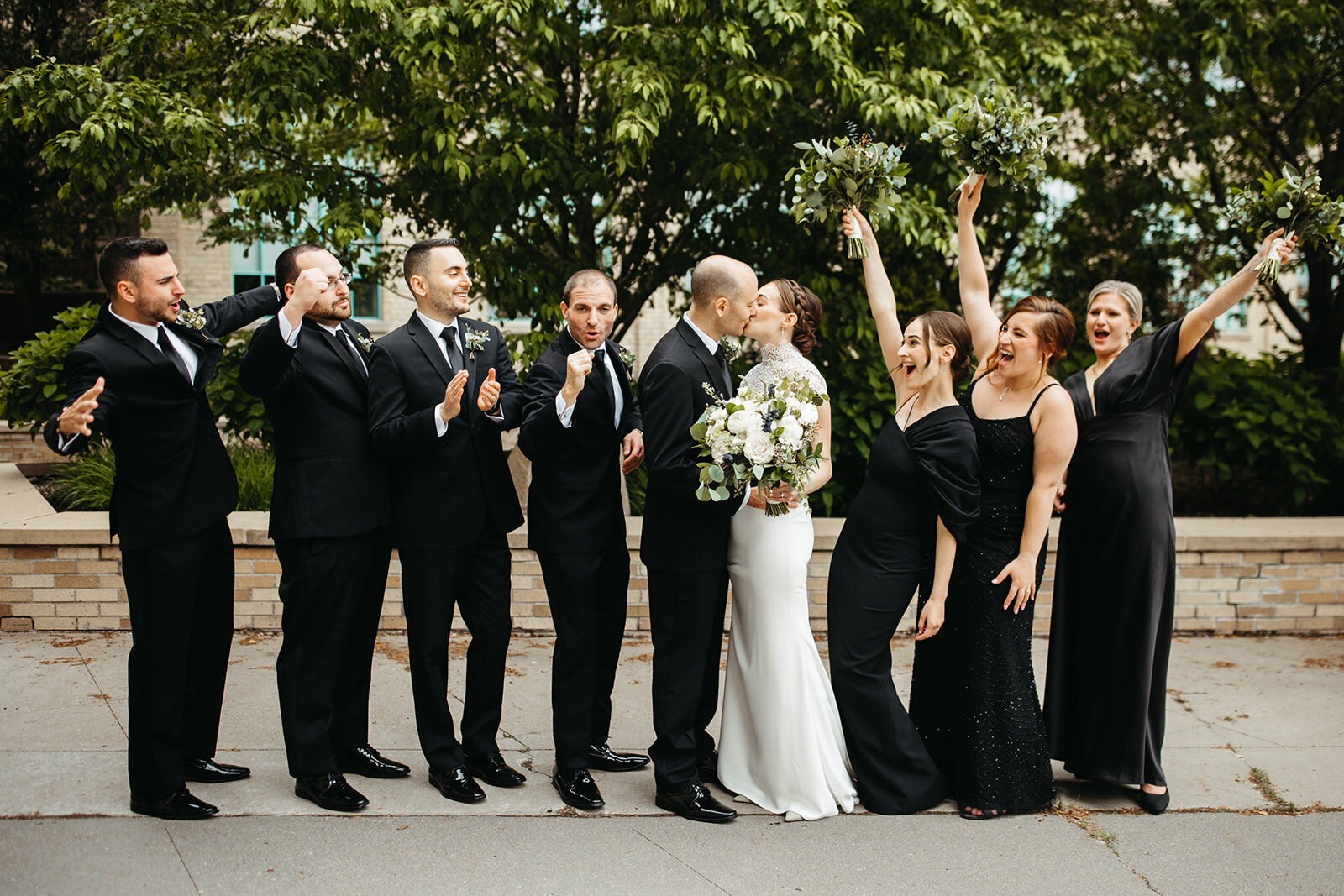 wedding-party-black-attire-celebrating