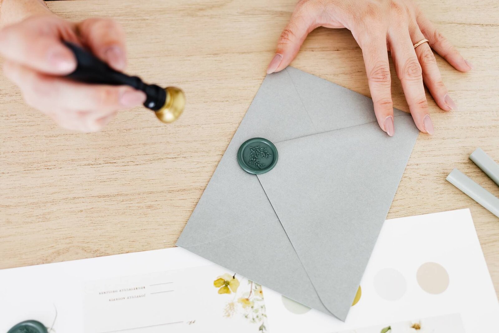 Wax Seal on a Sage Green Envelope for a Wedding