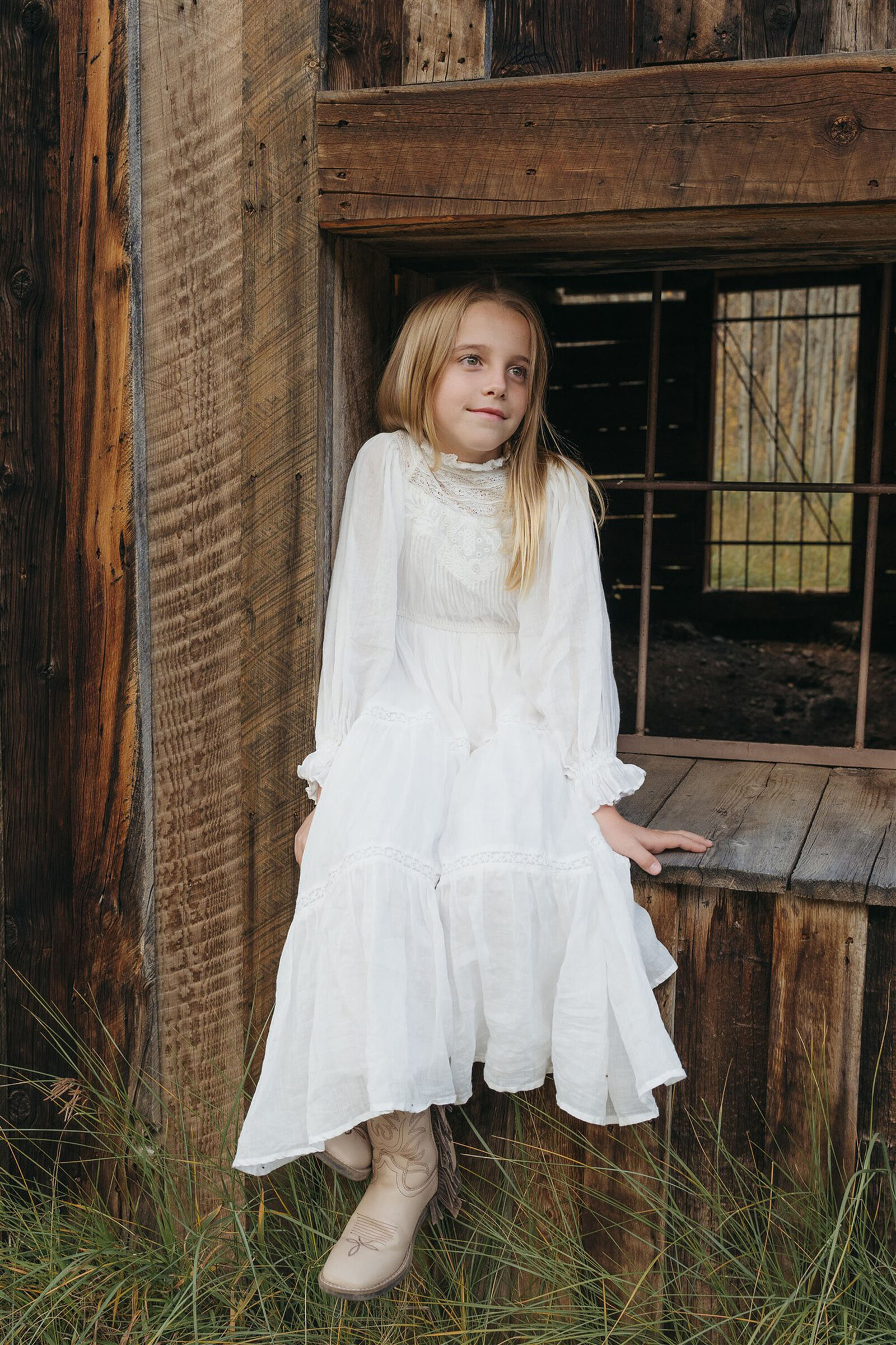 Editorial Aspen family photography — stylish family walking together in classic Ralph Lauren–inspired outfits.