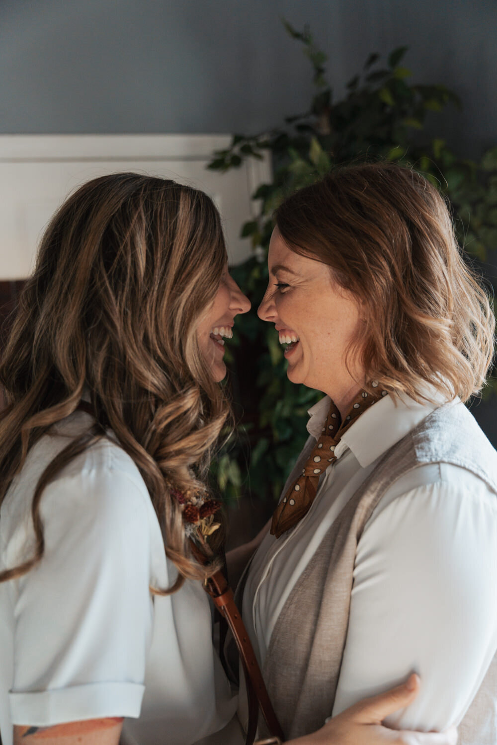 Two wives stand nose to nose in the Lipstick Lounge