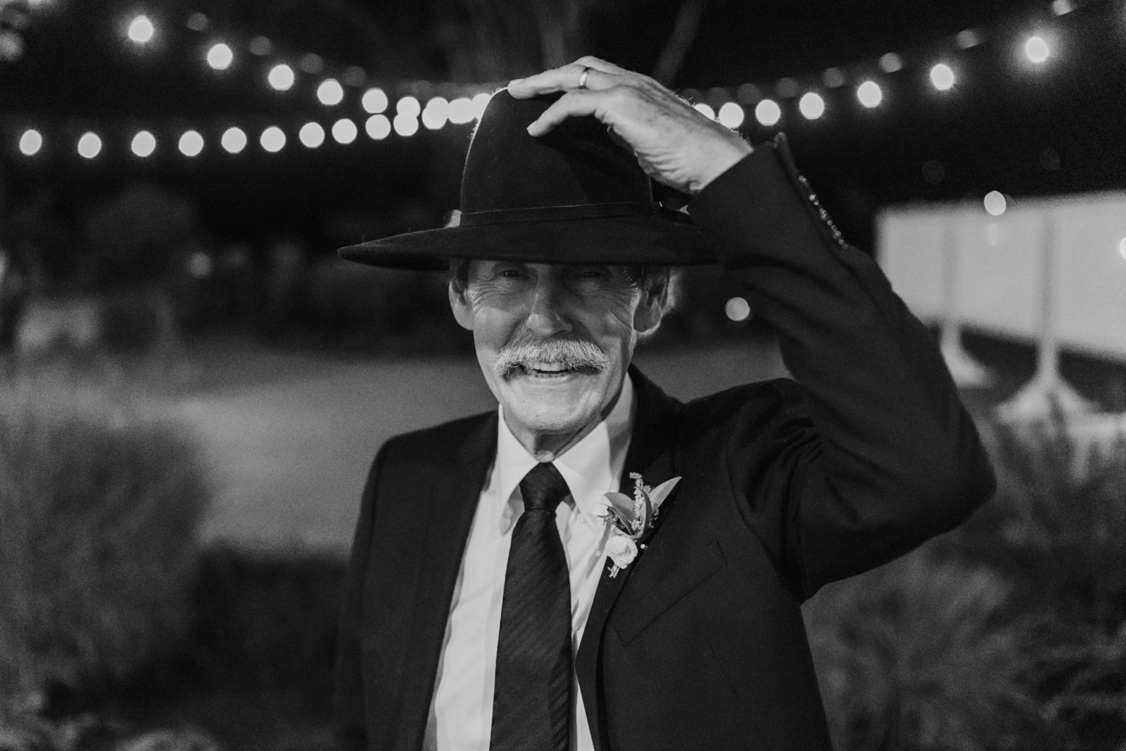 Father of the bride smiling for the camera