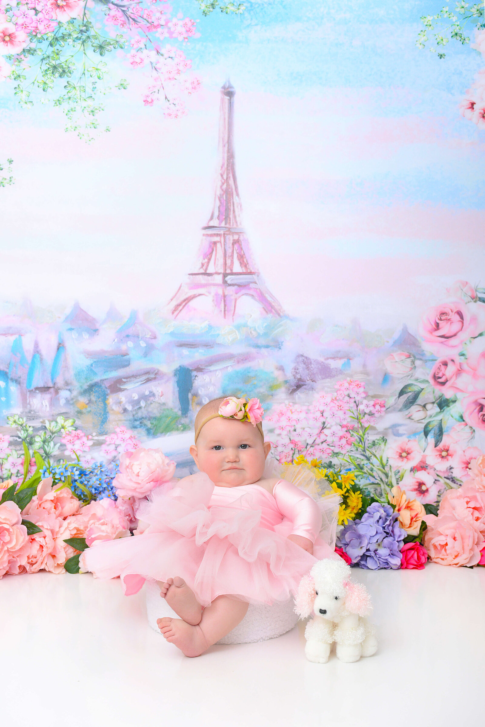 girl smiles at her paris milestone themed shoot
