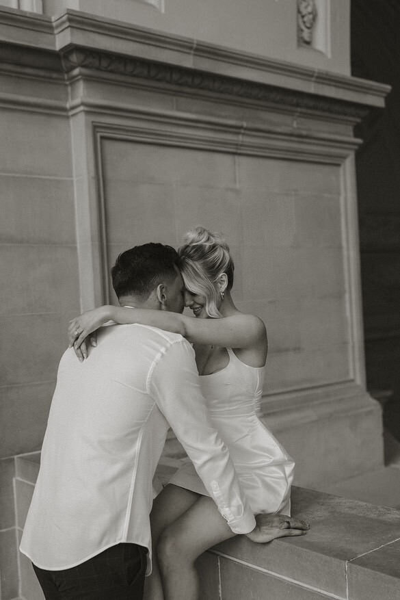 Beautiful modern couple photoshoot with beautiful hair and makeup done by Yana Beauty Studio - at San francisco city hall. 