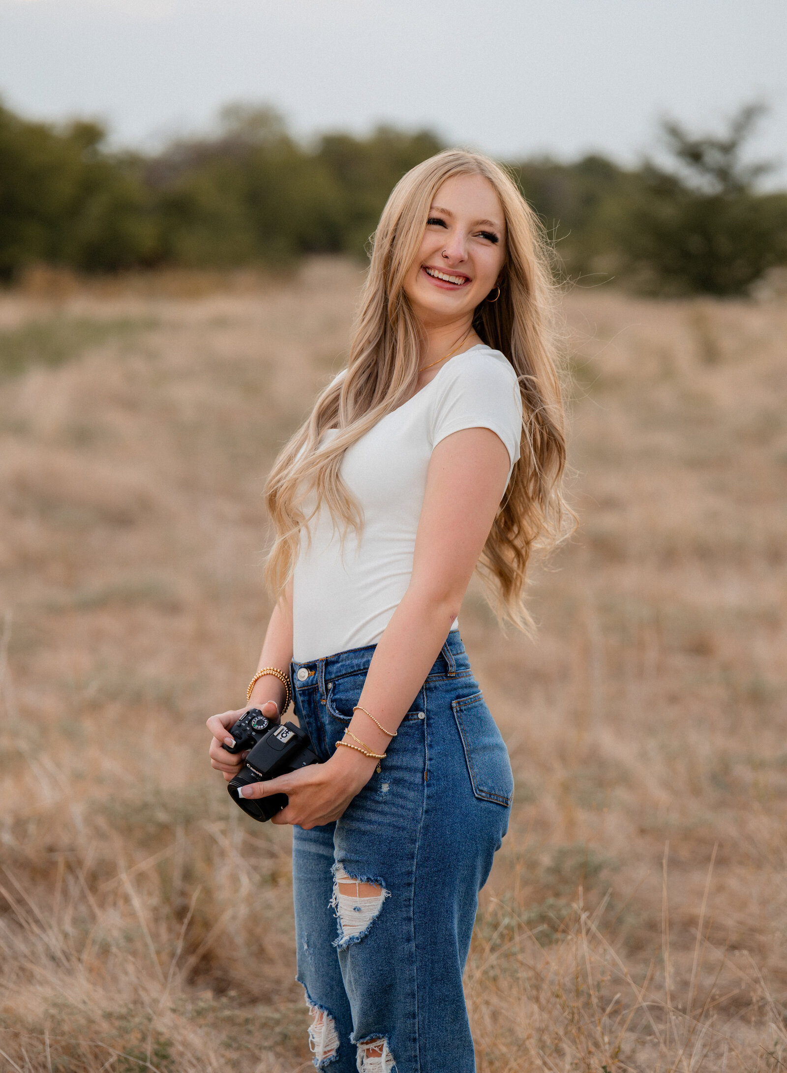 photographer laughing outdoors