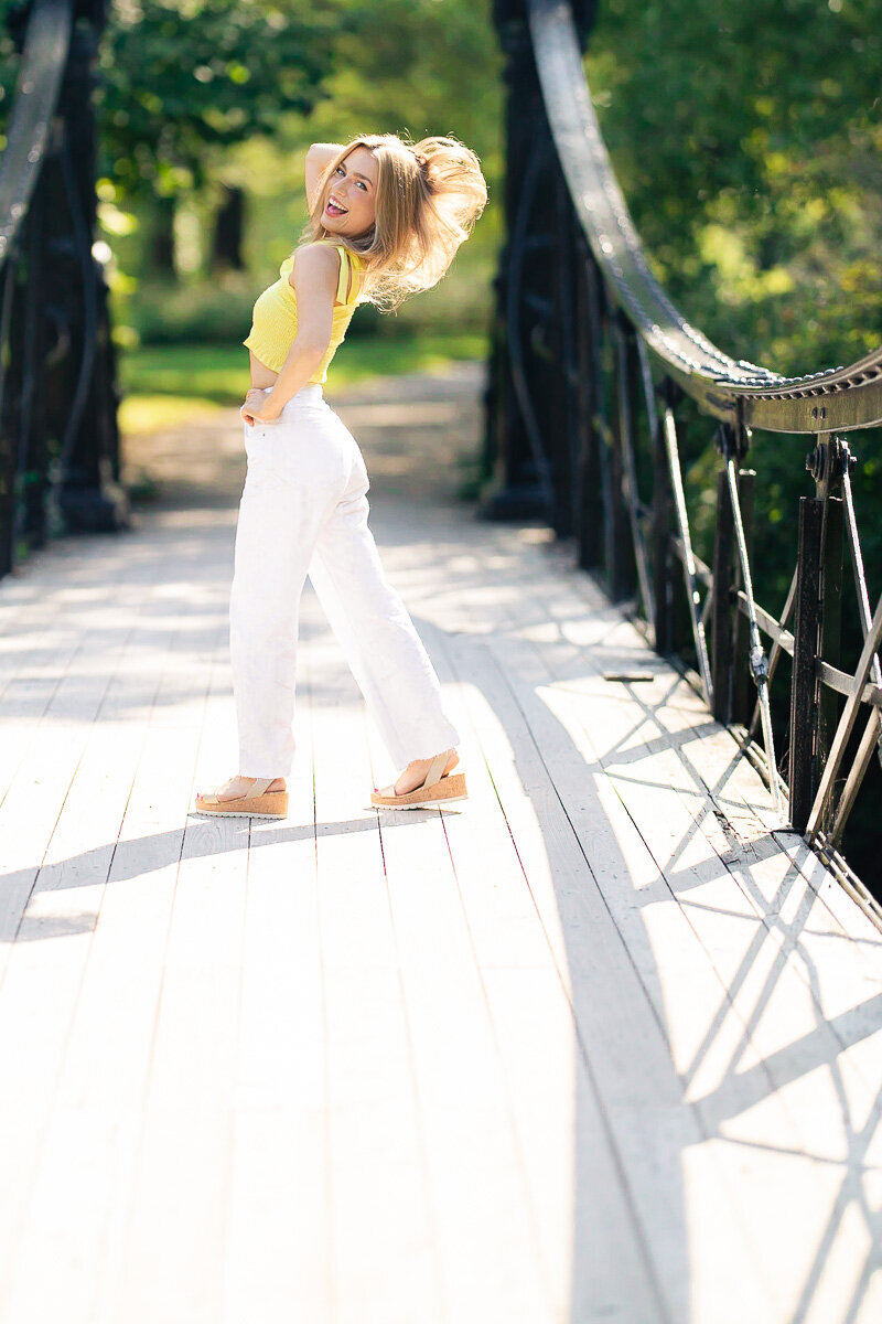 Marin flipping her hair on the victorian bridge in forest park stl