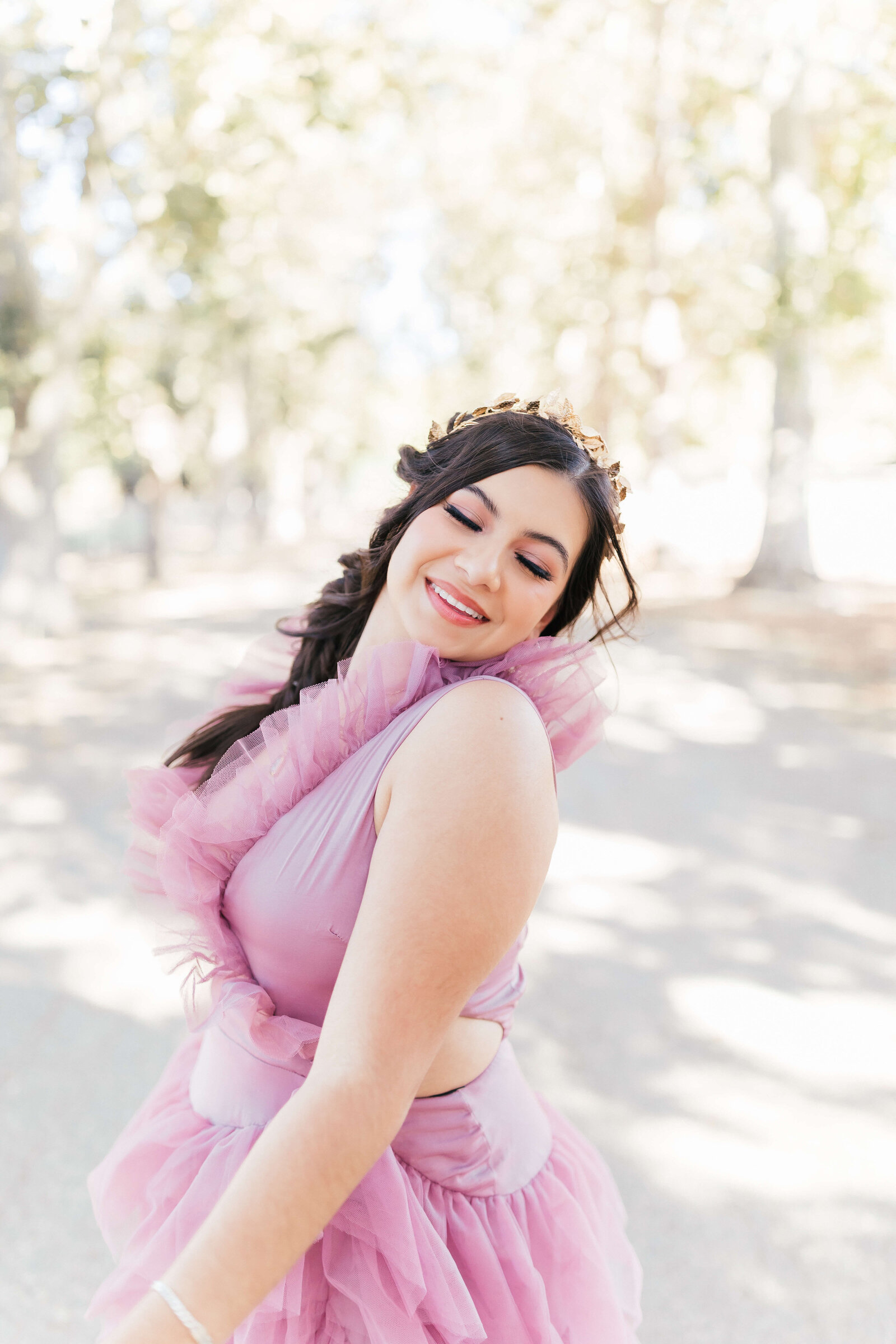 High school girl wearing whimsical flowy dress senior photo session