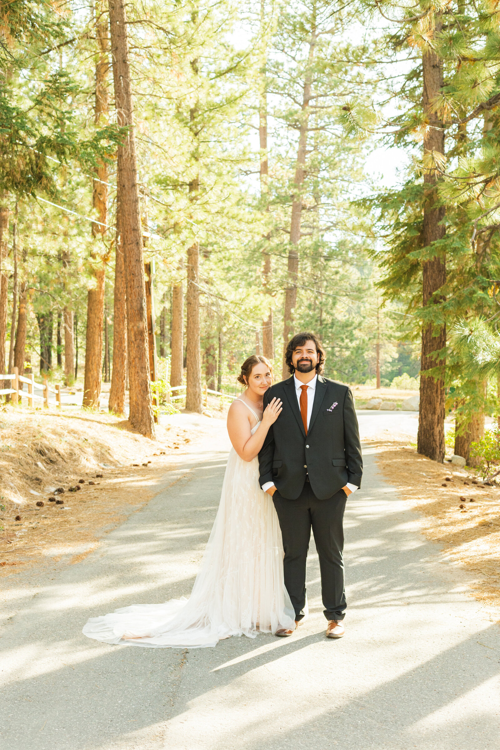 A couple celebrates their intimate elopement at a cabin at Big Bear Lake, California.