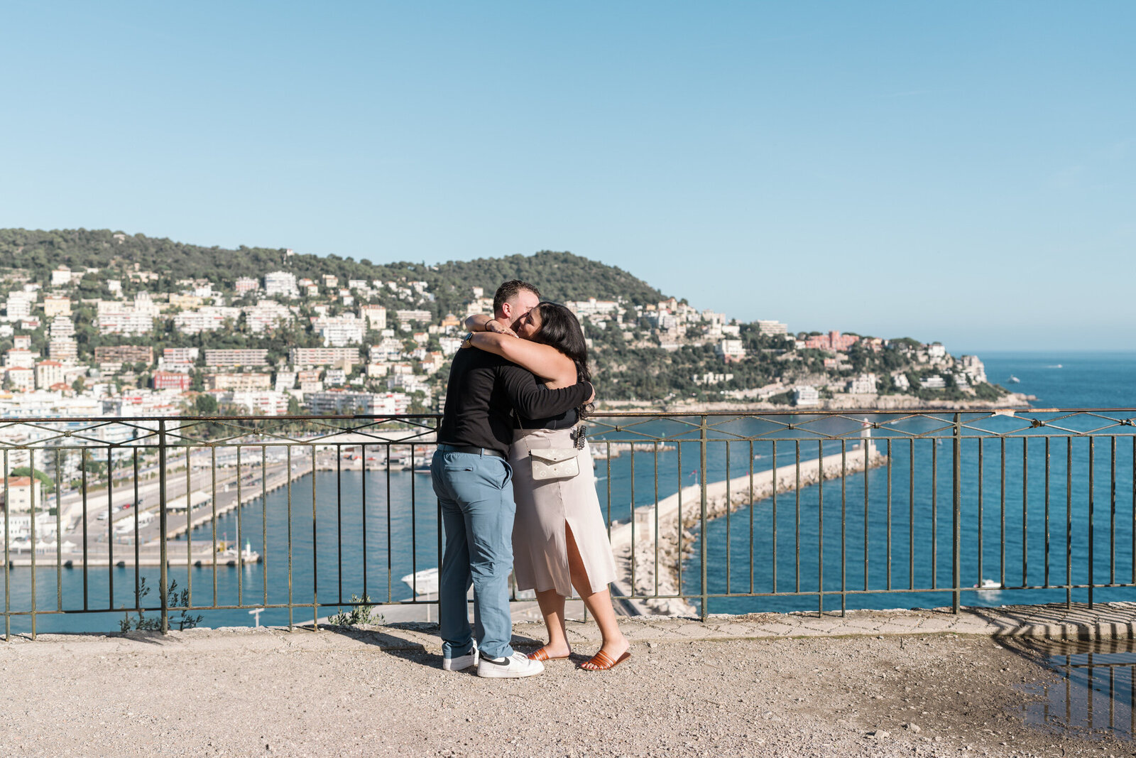 touching sunny surprise proposal with view of sea in nice france-04475