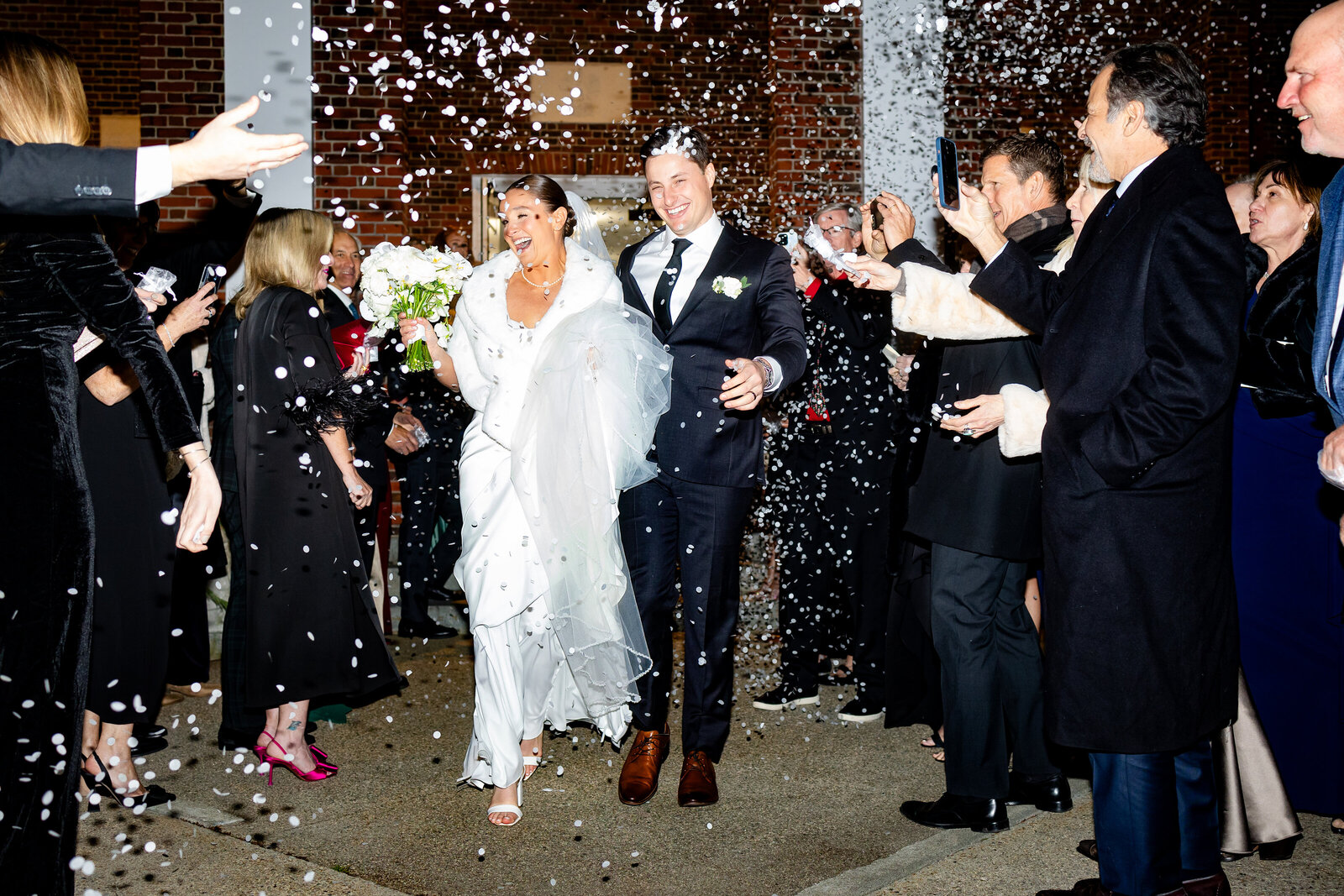 winter-church-exit-snowing-bride-and-groom
