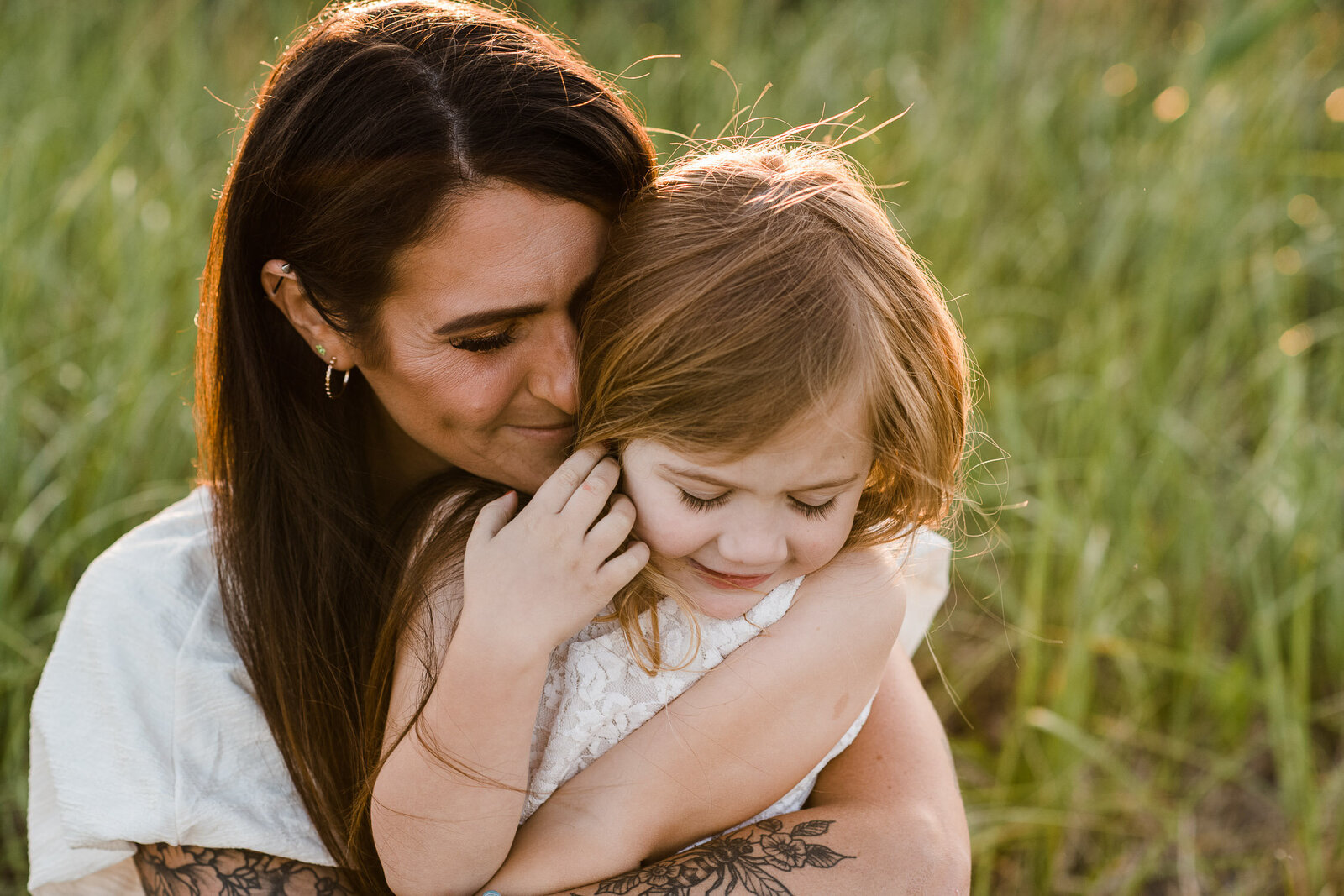 mom and daughter snuggle