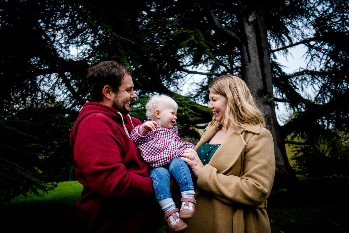 parents and their small child during a portrait shoot in the city of bath