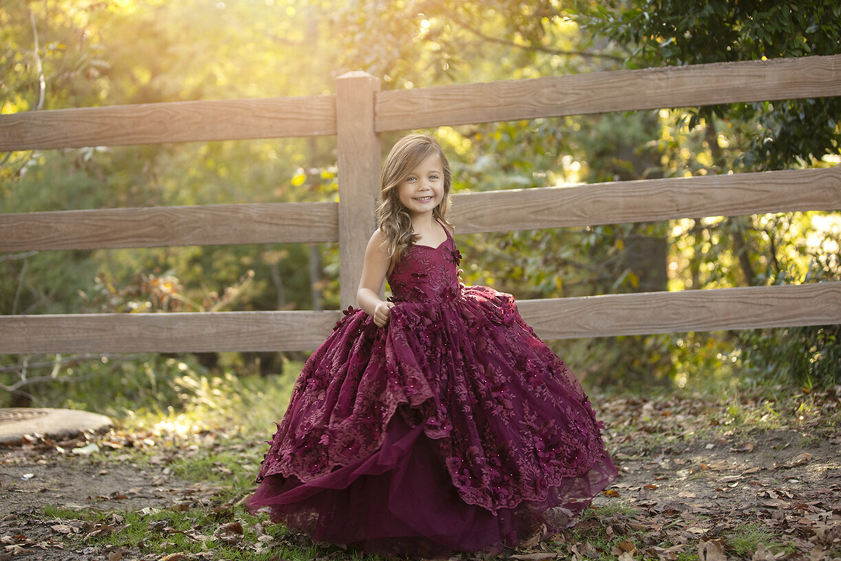 Girl in couture Little Dreamers Tutu gown, a McKinney Photographer