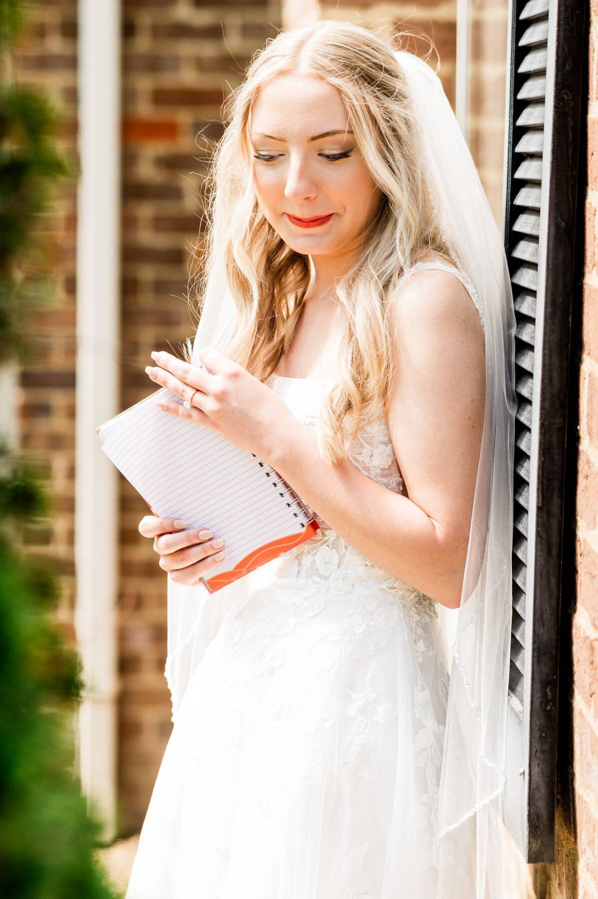 Bride reading vows