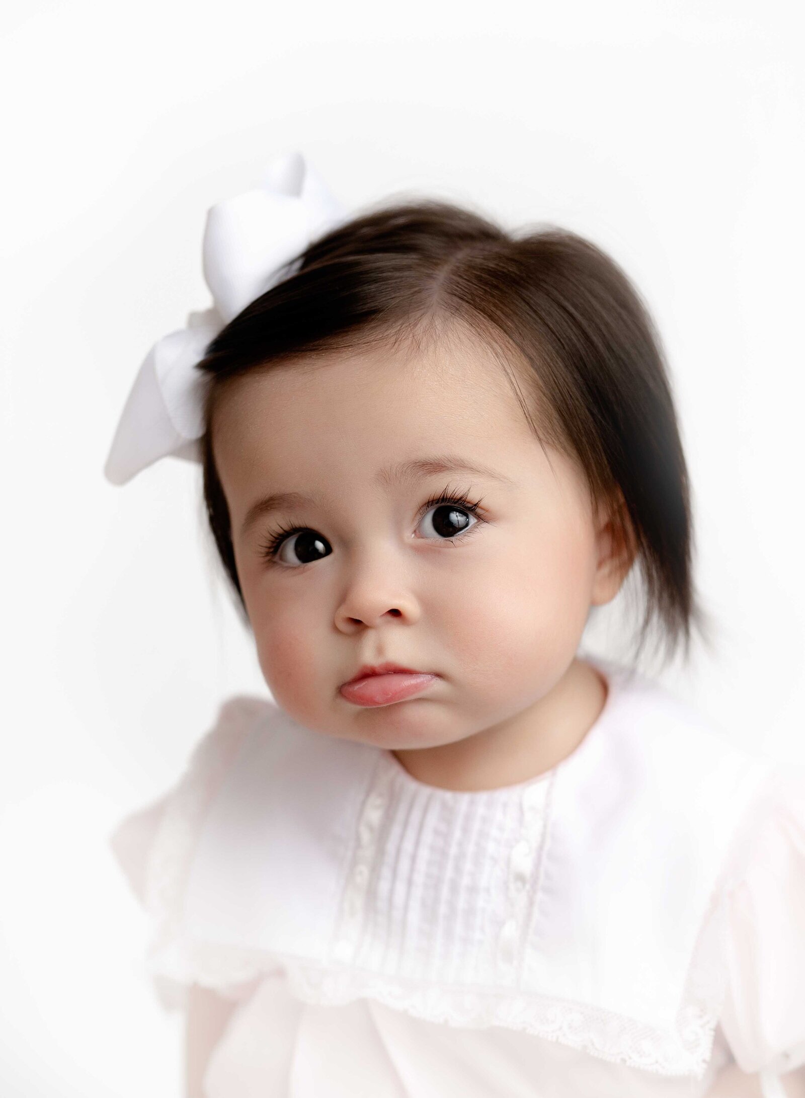 Heirloom close up portrait of baby girl. Heirloom photo taken by Jenni Nikki Photography in Atlanta, GA. 
