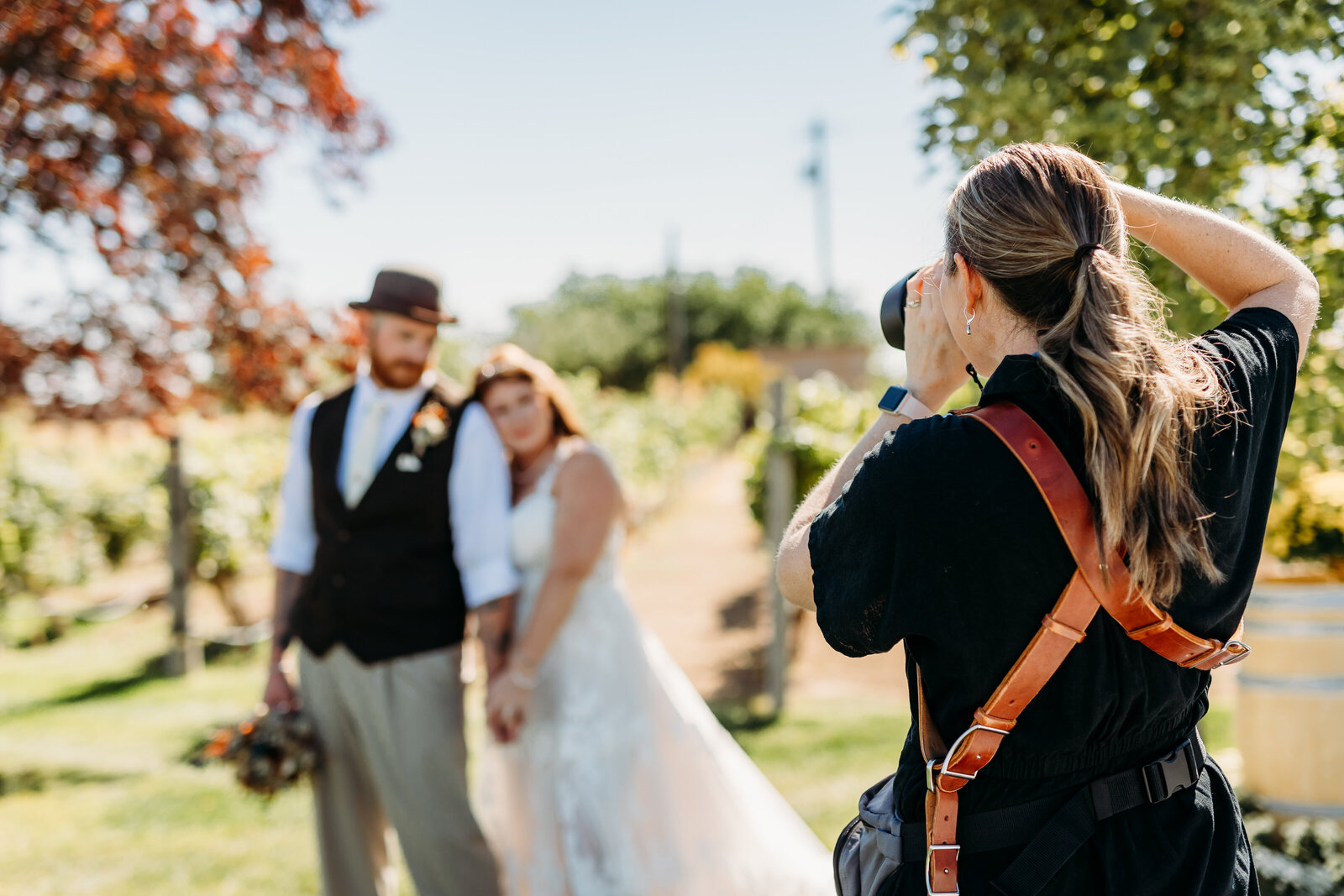 Julia taking pictures at a wedding
