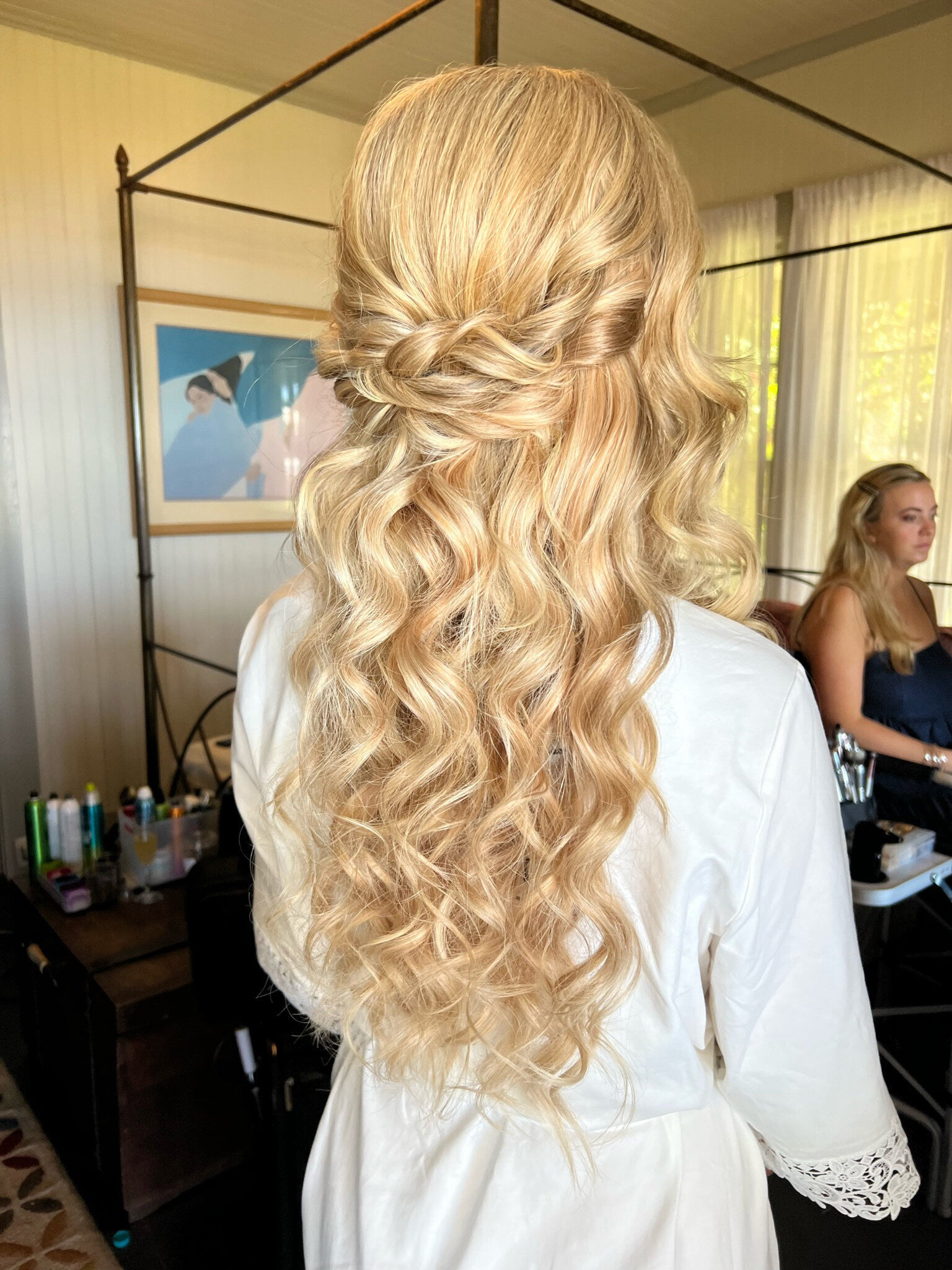 bride with her hair and makeup styled