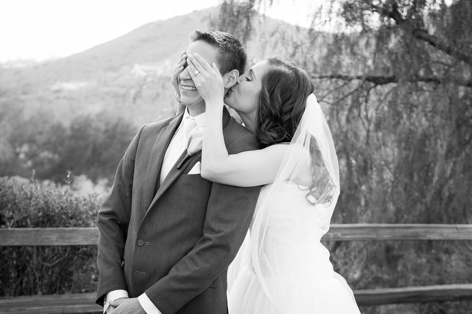 black and white picture groom seeing bride for first time