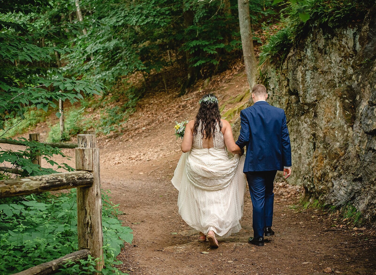 New England elopement couple walking on path