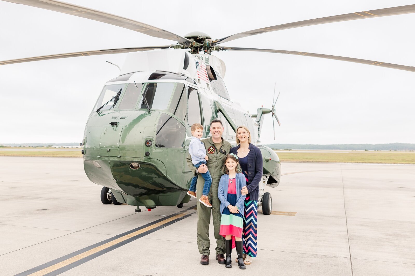 Family photo in front of Marine One helicopter