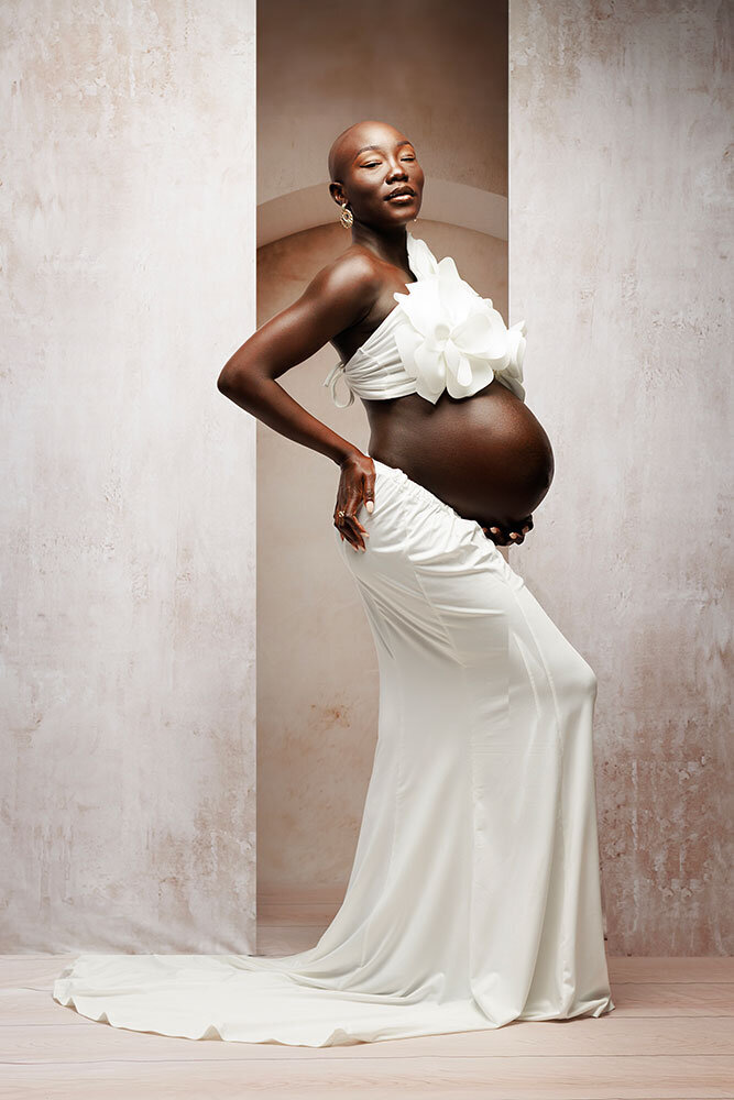 white-background-symmetry-studio-white-floral-top-ethnic-diverse-unique-prego-bump-beautiful-glowing-preggers
