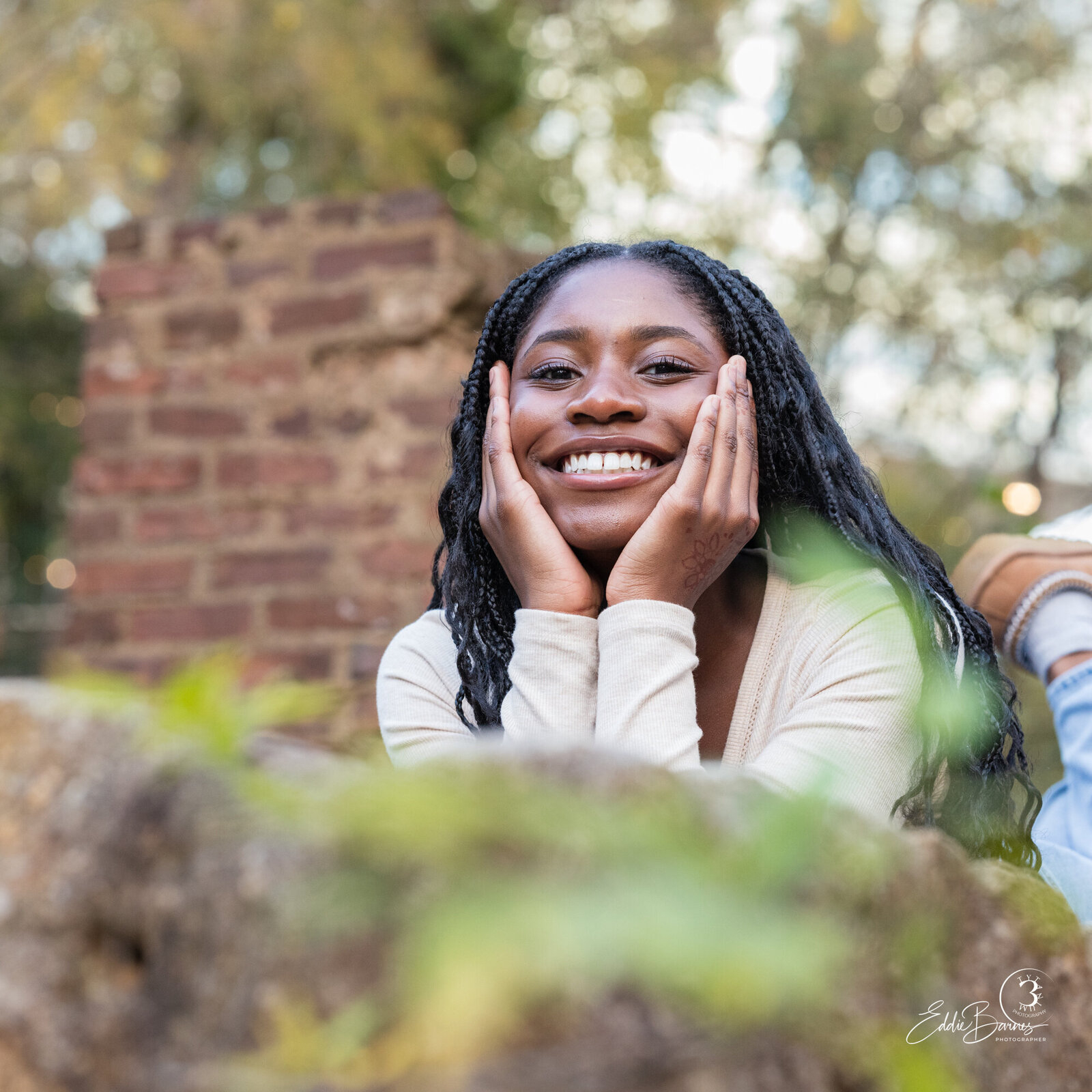 Outdoor family portrait glowing with natural light.