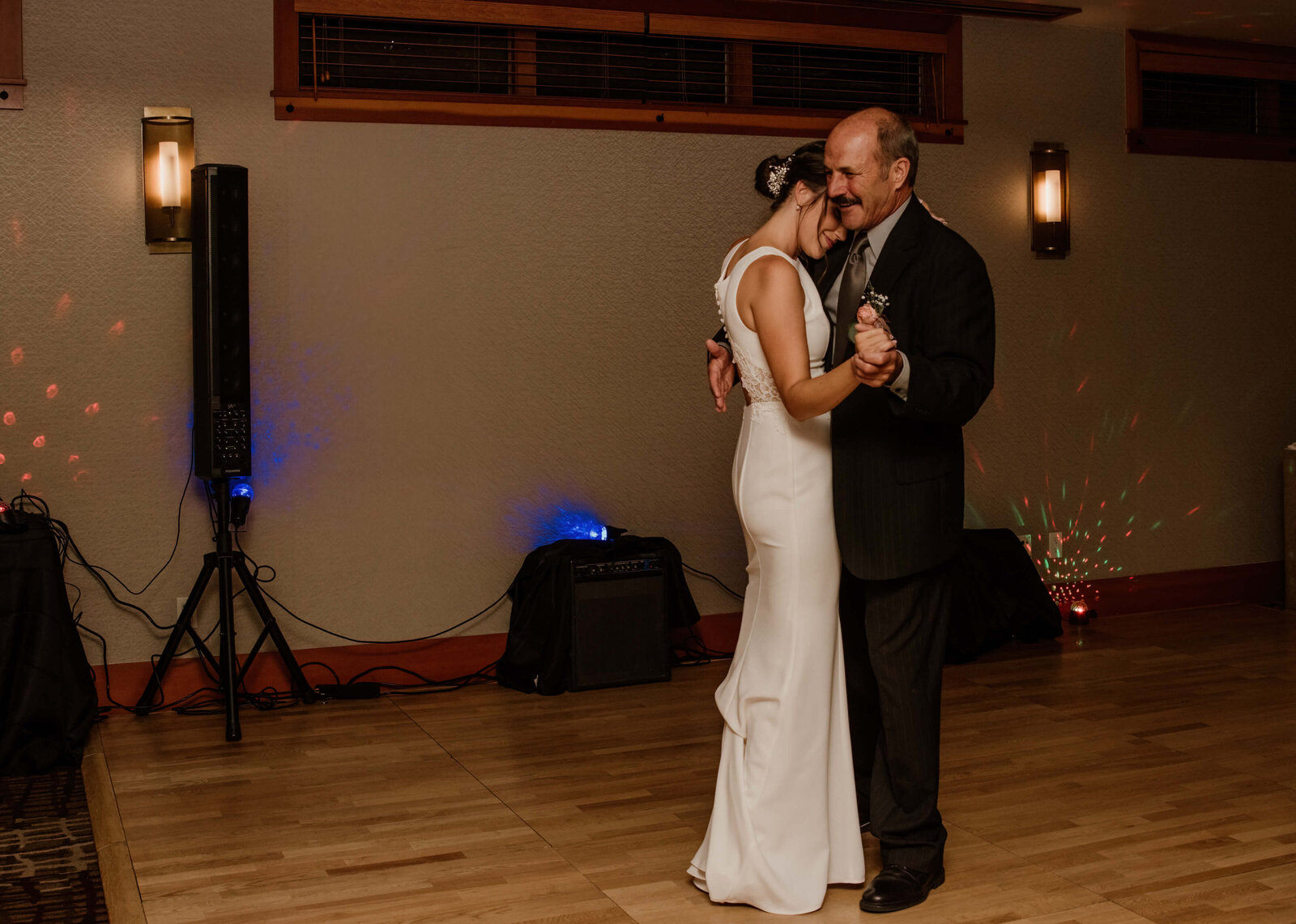 Father daughter dance at wedding reception.