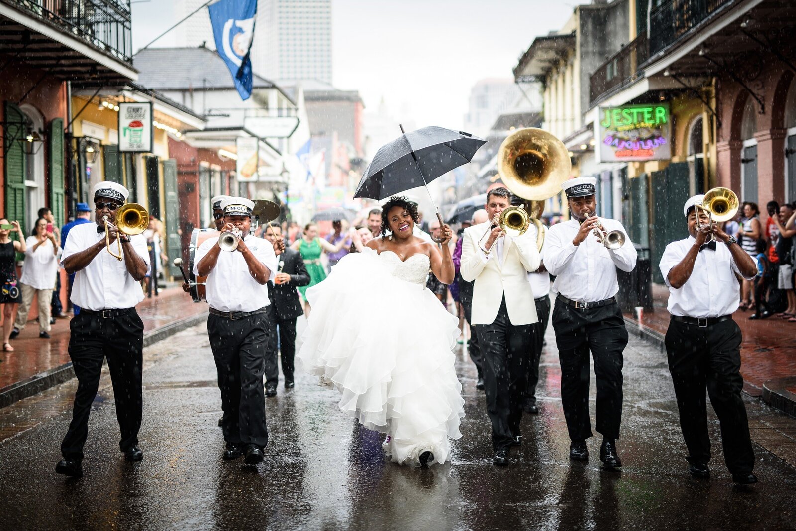 Wedding second line parade in the rain with the Kinfolk Brass Band