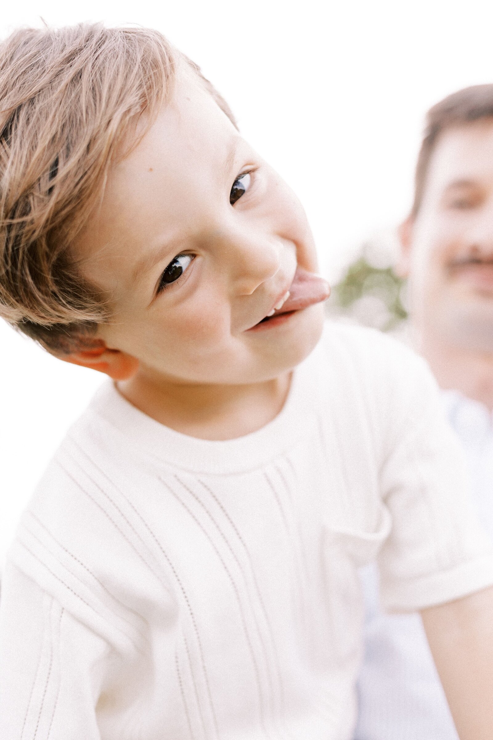 child making silly face during peoria illinois family photos 