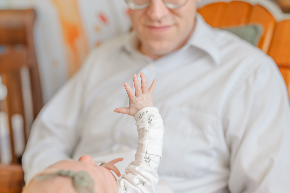 baby's hand during lifestyle newborn picture