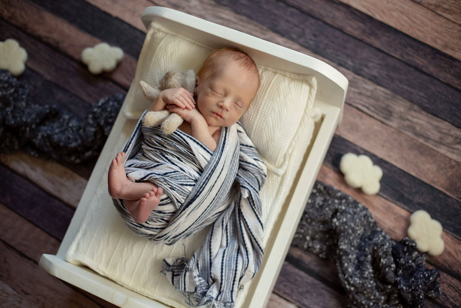 ABQ-baby-boy-newborn-session-with-sleeping-baby-and-navy