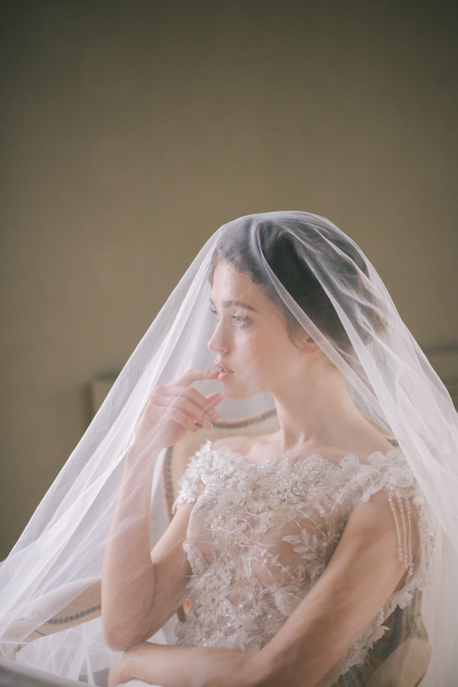 editorial of a gourgeus groom with veil