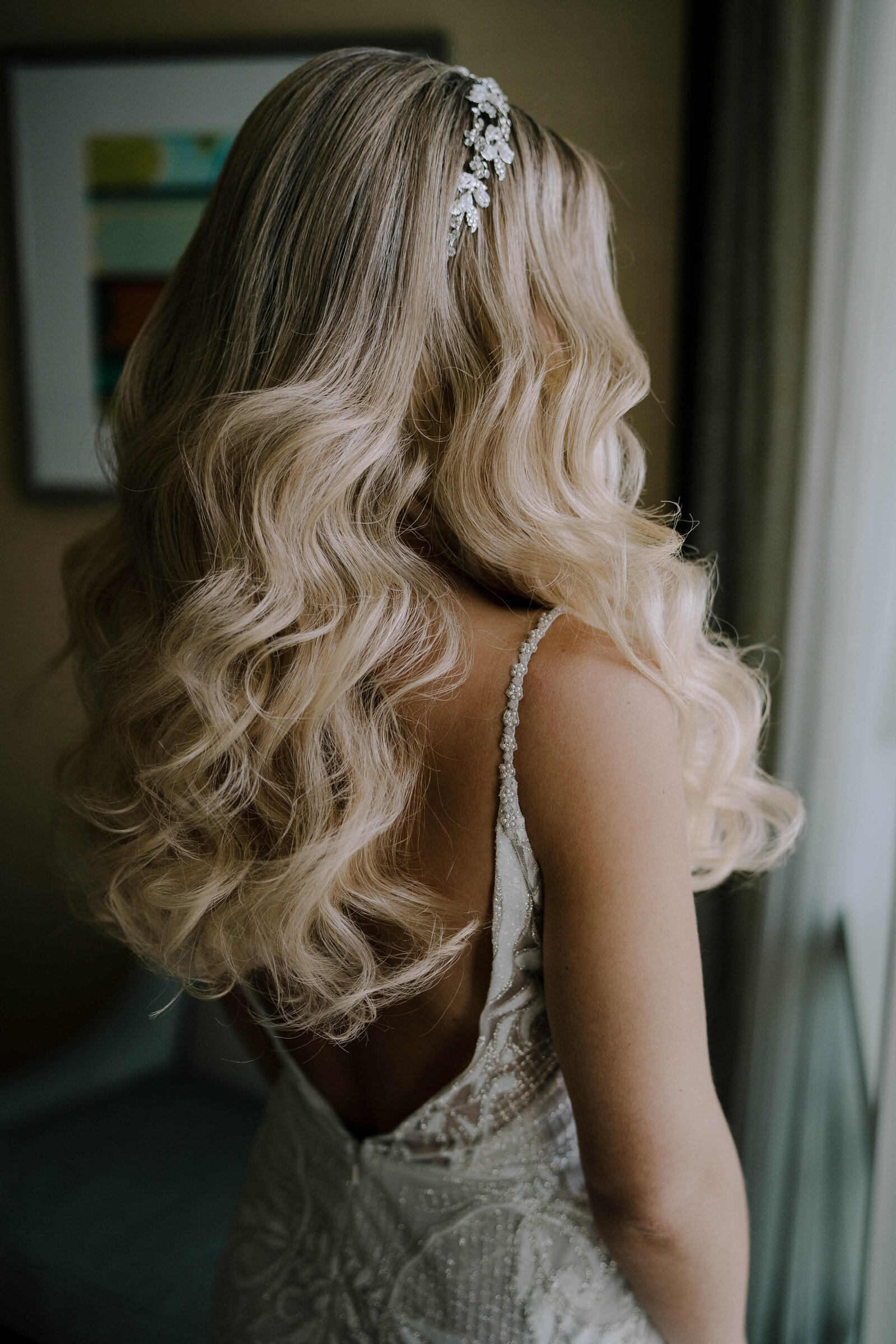 Capture the timeless beauty of an elegant bridal updo hairstyle crafted by our Philadelphia bridal hair stylist. Perfect for your wedding day.
