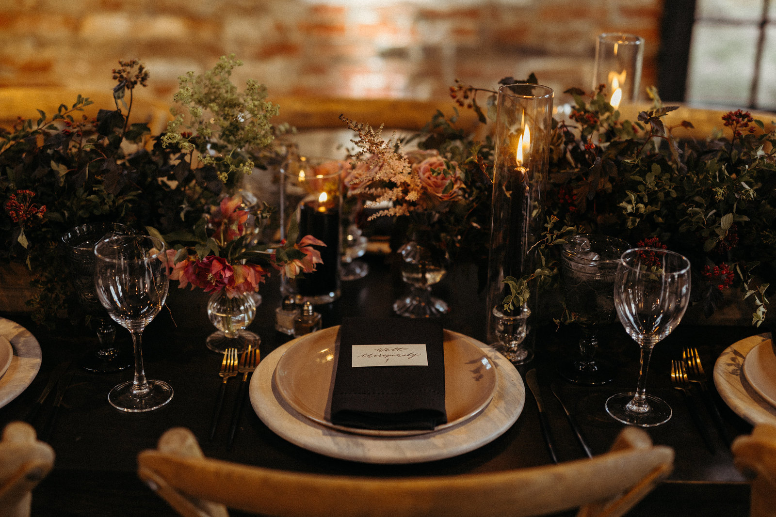 Moody All-Black  Industrial Wedding Table Greenery at Washington Mill Dye House
