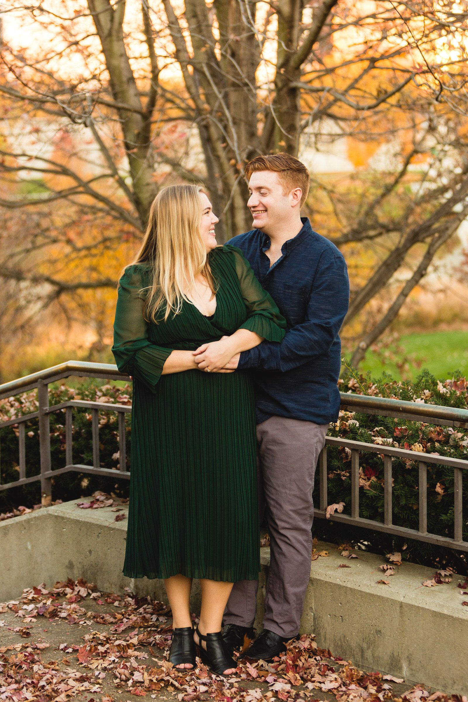 engaged couple looking at each other for ohio portraits