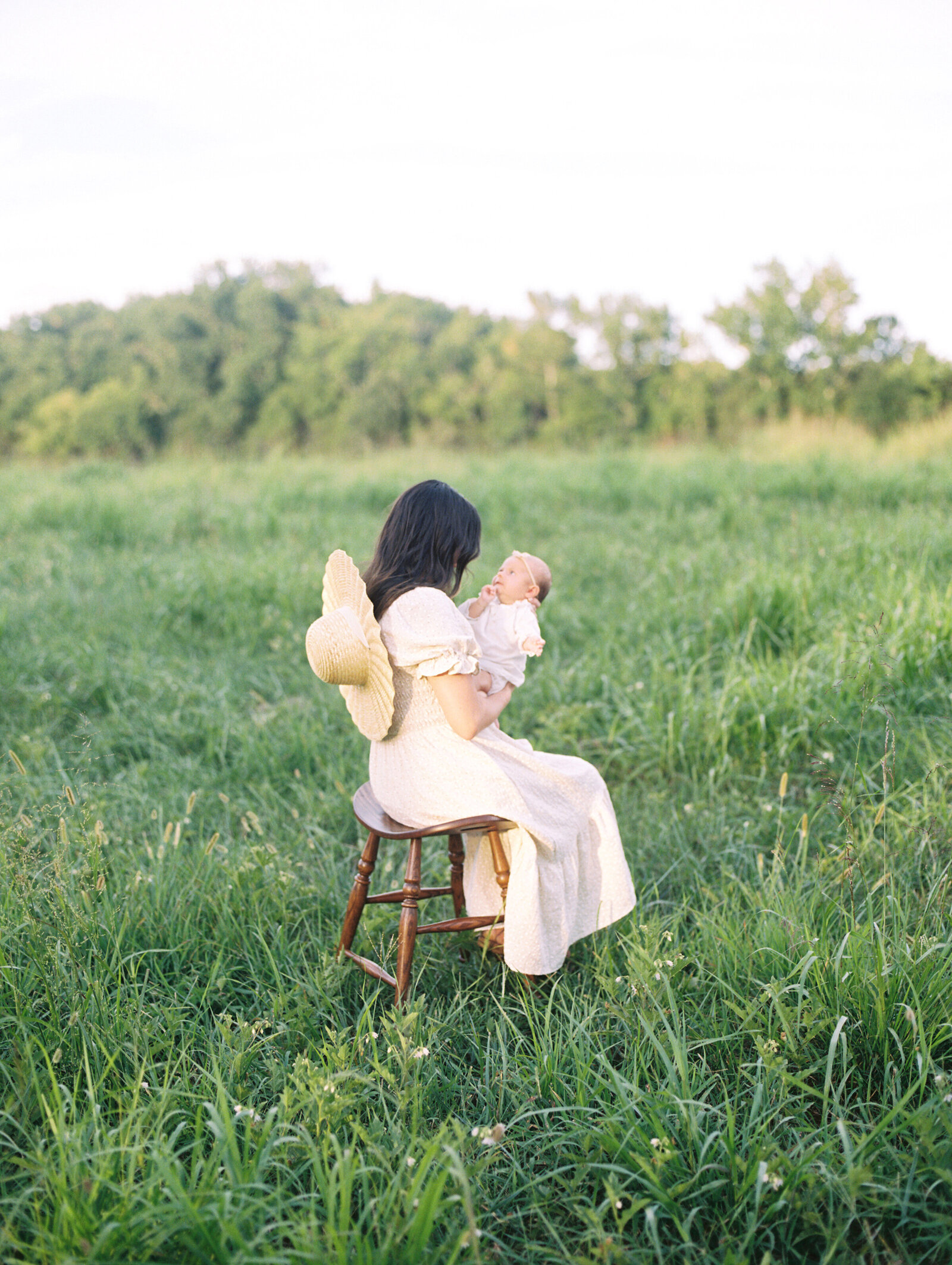 mother and baby film photo on field