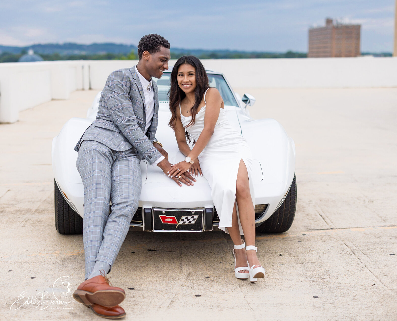 engagement image on top of building