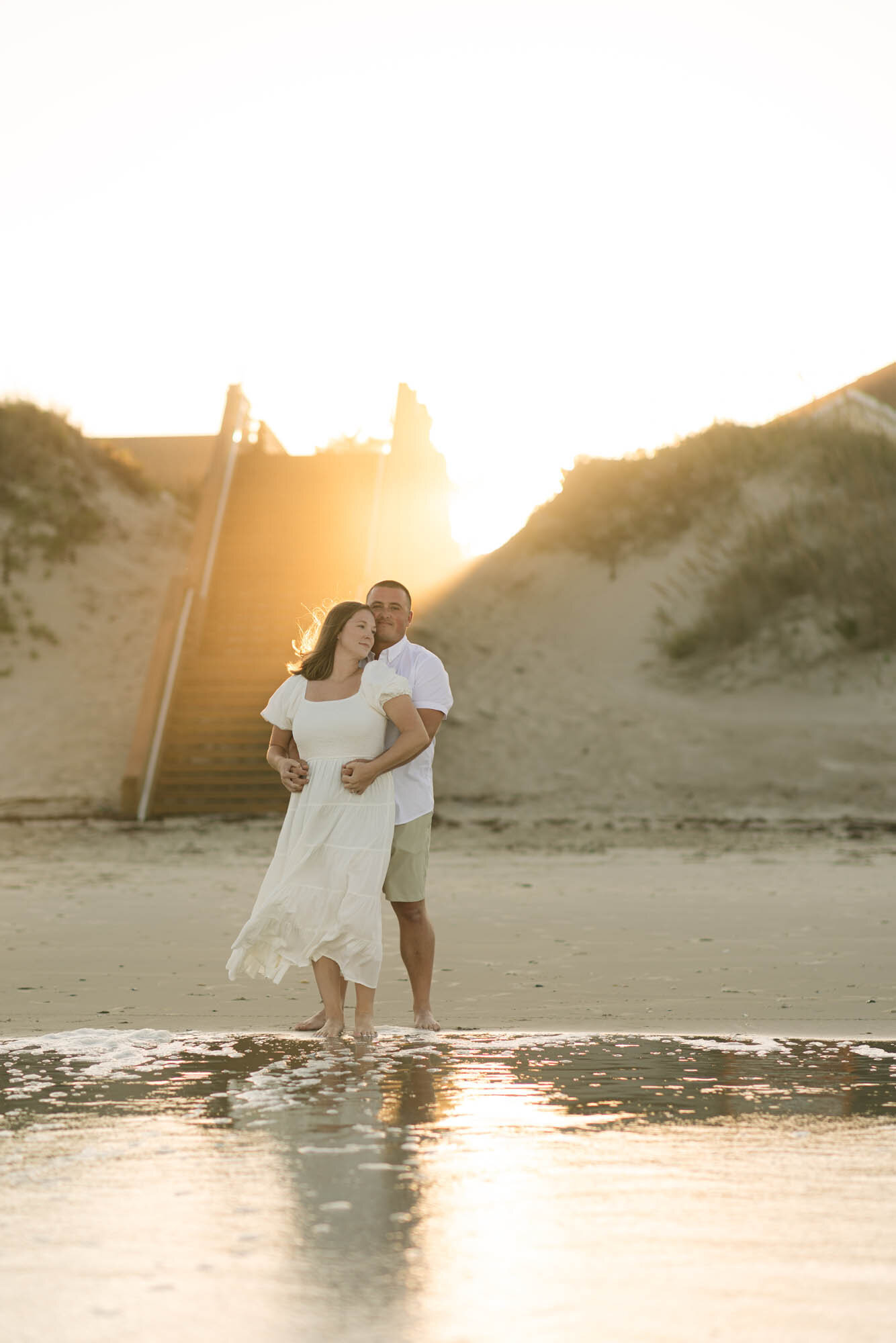 Couple on the Outer Banks beach at sunset